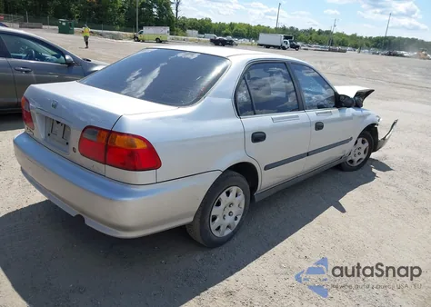 1999 Honda Civic Lx from USA, damaged, VIN 1HGEJ6679XL058046